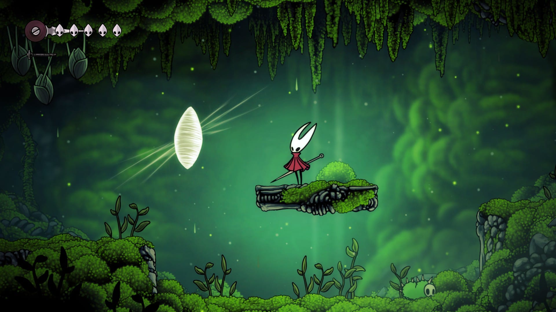 Hornet next to a cocoon in Moss Grotto