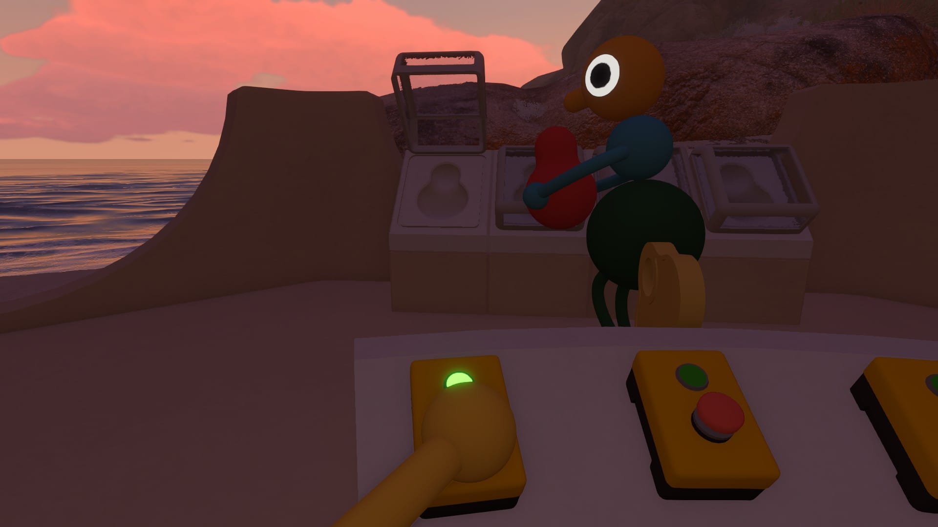One teammate holding a button to allow the other to place the doll in the box